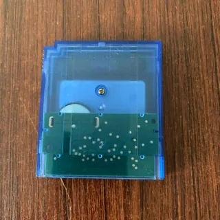 RetroForge source photo: GB/GBC circuit board visible through transparent cartridge shell