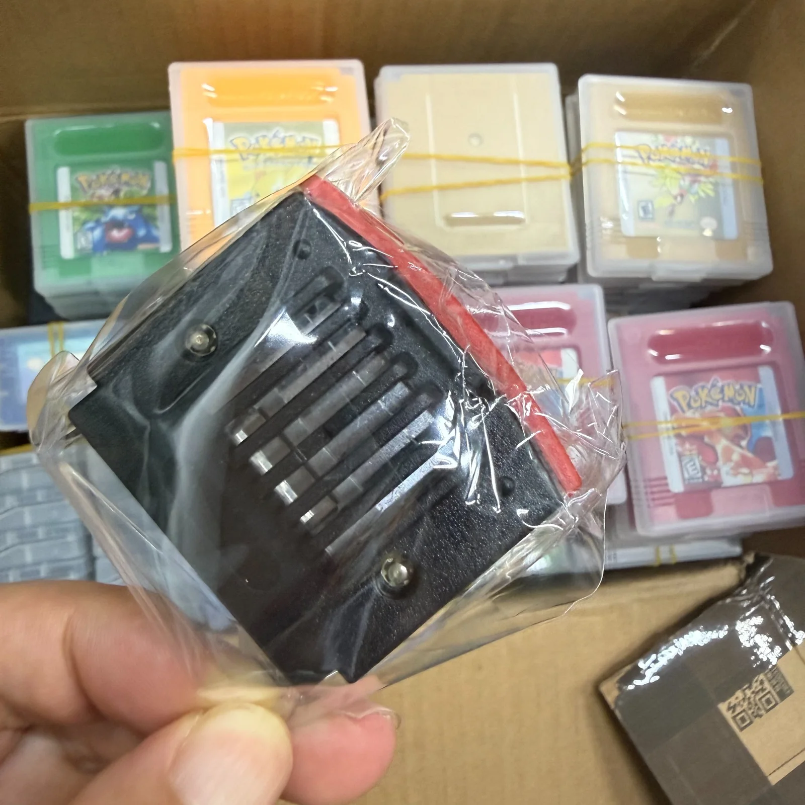Original product photograph showing distinct retro cartridge shell shapes and finishes